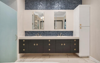 dark cabinets and a light countertop create elegance for this modern bath design