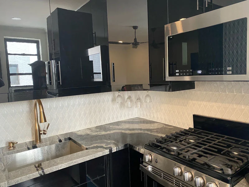 Alvic Luxe Black Gloss Kitchen Cabinets for a Bay Ridge Condo designed by Total Kitchen Outfitters
