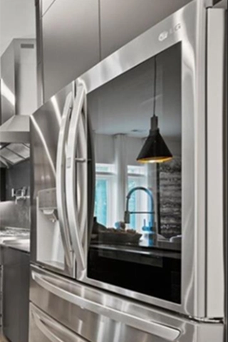 stainless-steel-fridge-in-Black-kitchen