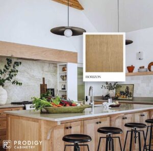 Bright kitchen with light wooden cabinets and spacious design, featuring Horizon finish by Prodigy Cabinetry